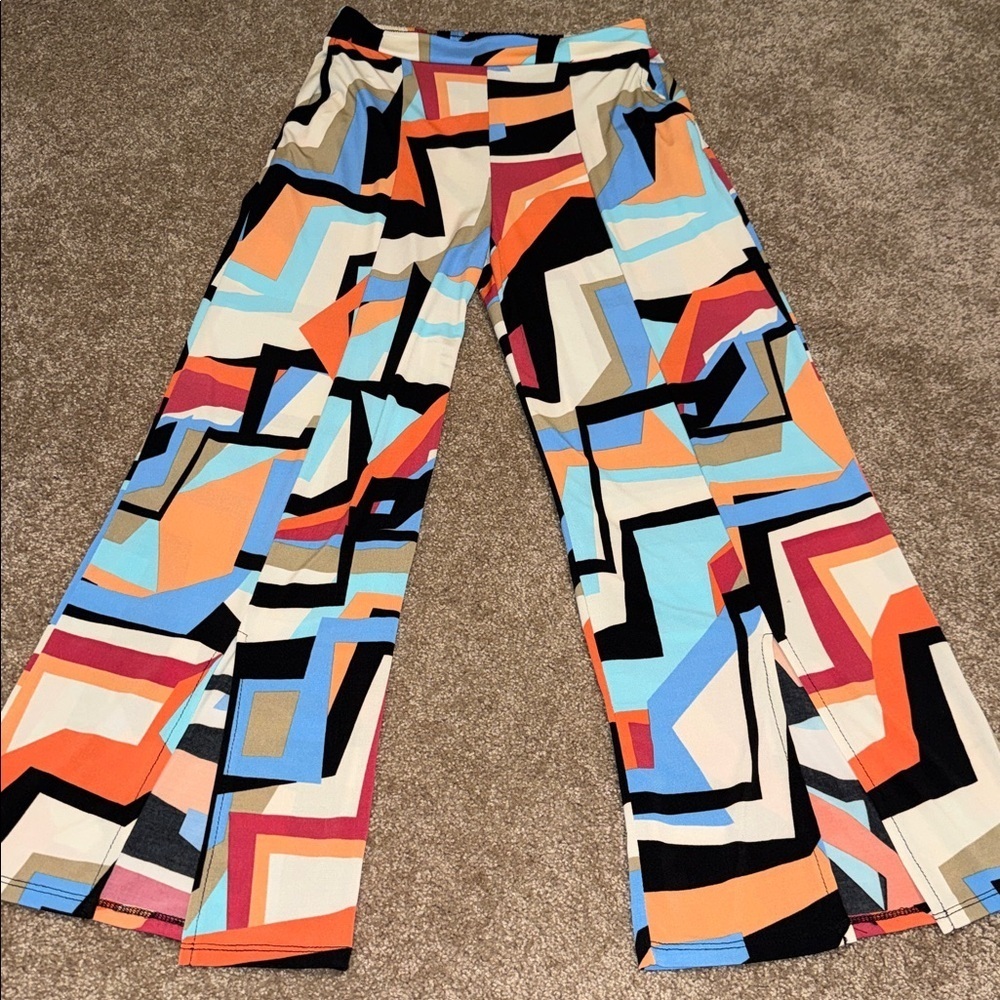 NEW LAST TANGO women's print flare split leg pants - XS. B1